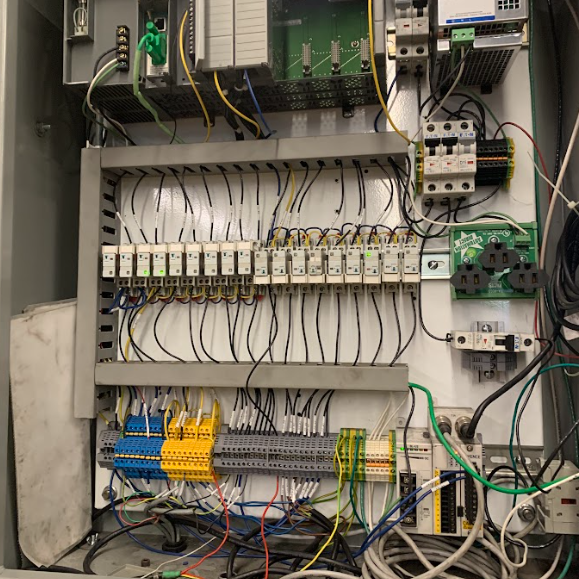 Electrical control cabinet with PLC and relays